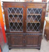 A Jaycee oak bookcase with leaded glazed doors