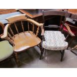 A smokers bow elbow chair together with a 19th century mahogany elbow chair