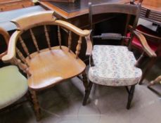 A smokers bow elbow chair together with a 19th century mahogany elbow chair