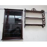 A 20th century wall mounted display cabinet together with a set of open hanging shelves