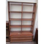 A modern teak bookcase, with eight shelf sections,