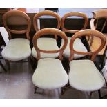 A set of five Victorian mahogany balloon back dining chairs