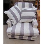 A striped upholstered armchair