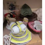 A Drostdy Ware pottery dish painted with a Ndebele Woman together with a wall plaque of a lady in