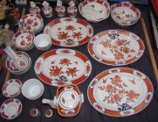 An Oriental red and blue part dinner set