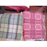 A welsh blanket together with a collection of blankets etc