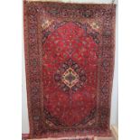 A large red ground rug,