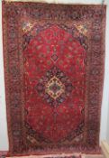 A large red ground rug,