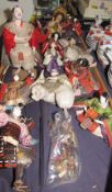 A collection of Japanese dolls in traditional dress with carved and composition heads