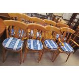 A set of eight kitchen dining chairs,