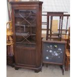 A 20th century mahogany standing corner cupboard together with an oak gate leg dining table,