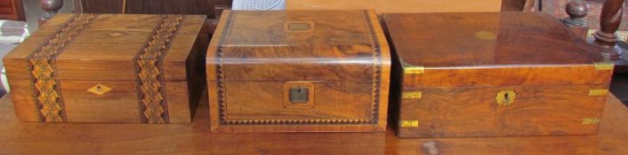 A 19th century walnut laptop desk together with two walnut jewellery boxes