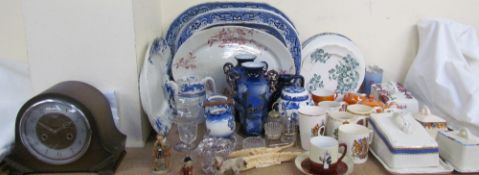 A Smiths Enfield mantle clock together blue and white meat plates, commemorative mugs,