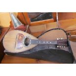 An R Porto & Figli bowl back eight string mandolin, together with a case,