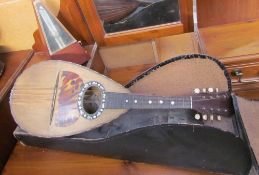 An R Porto & Figli bowl back eight string mandolin, together with a case,