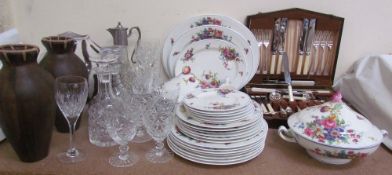 A Royal Worcester Roseland pattern part dinner set together with glass decanters, drinking glasses,