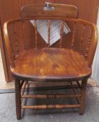 A 19th century stick back captain's chair,