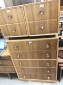 An oak and walnut chest of drawers and a pair of matching bedside cabinets