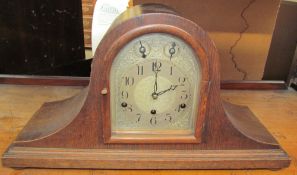 An oak cased mantle clock,