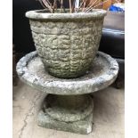 A reconstituted stone planter and bird bath