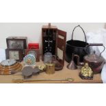 A Kendal and Dent mantle clock together with a collection of Smiths clocks, a barometer,