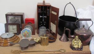 A Kendal and Dent mantle clock together with a collection of Smiths clocks, a barometer,