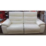 A cream leather two seater electric reclining settee