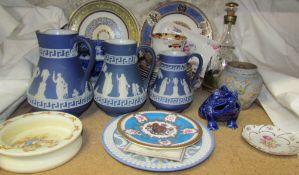 A set of three graduated Wedgwood blue jasper jugs together with collectors plates.