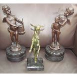 A bronze model of goat standing on its rear leg,