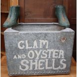 A zinc water tank painted “Clam and Oyster Shells” together with a pair of cast iron boot planters