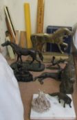 A brass horse door stop together with a bronze horses head, bronze horse, bronze fox,