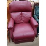 A red leather electric reclining chair