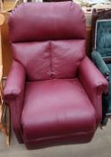 A red leather electric reclining chair