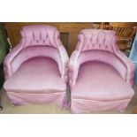 A pair of upholstered nursing chairs