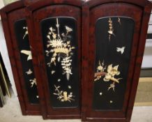 A set of four Japanese panels inlaid with bone and mother of pearl