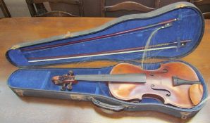 A violin with a two piece back and ebony stringing, 61cm long, back including button, 37.