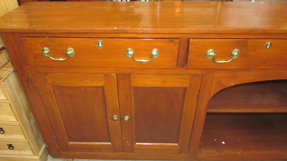 A 20th century stained pine sideboard of larger size and rectangular form, - Image 2 of 2