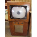 An Ekco vision TC185 television receiver in a walnut case (Untested,