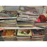 A large collection of LP's including The Beatles, David Bowie, Shirley Bassey, Bob Dylan,