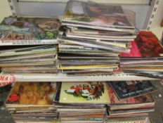 A large collection of LP's including The Beatles, David Bowie, Shirley Bassey, Bob Dylan,