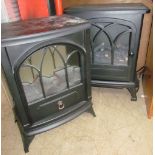 A pair of Focal Point LED electric stoves together with another stove