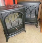 A pair of Focal Point LED electric stoves together with another stove