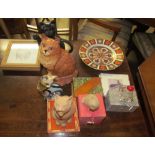 A Beswick cat together with a Royal Crown Derby porcelain plate, decorative cat figures,