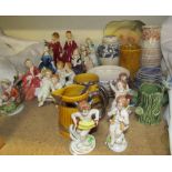 A pair of Royal Worcester figures of boys on a bench together with assorted continental cherub