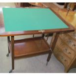 A 20th century mahogany card table / tea trolley