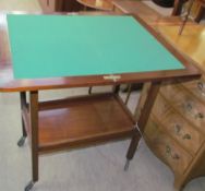 A 20th century mahogany card table / tea trolley