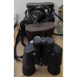 A Canon Eos 1000F 35mm camera together with a pair of Omiya 10 x 50 binoculars and a pair of Regent