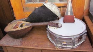 An R Porto & Figli bowl back eight string mandolin, together with a case,