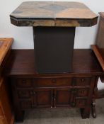 A Chinese hardwood side cabinet together with a slate topped coffee table