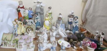 A Yardley soap figure group together with a collection of Royal Doulton figures,
